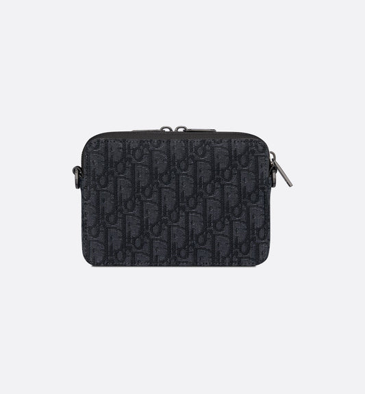 Pochette zippée à bandoulière
Toile jacquard DI°R Oblique noir - #1