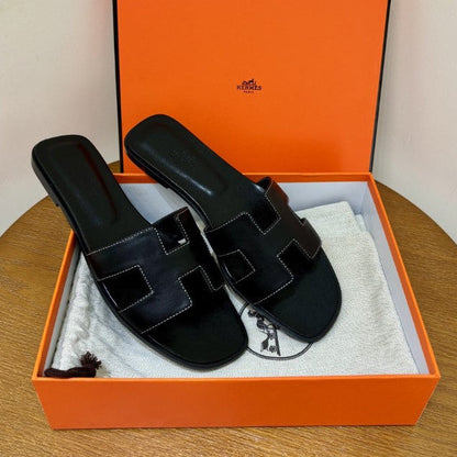 HERM°S - Claquettes Noir
