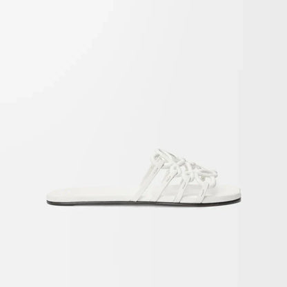 L°EWE - Petal Anagram slide in soft calfskin Blanc