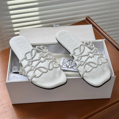 L°EWE - Petal Anagram slide in soft calfskin Blanc