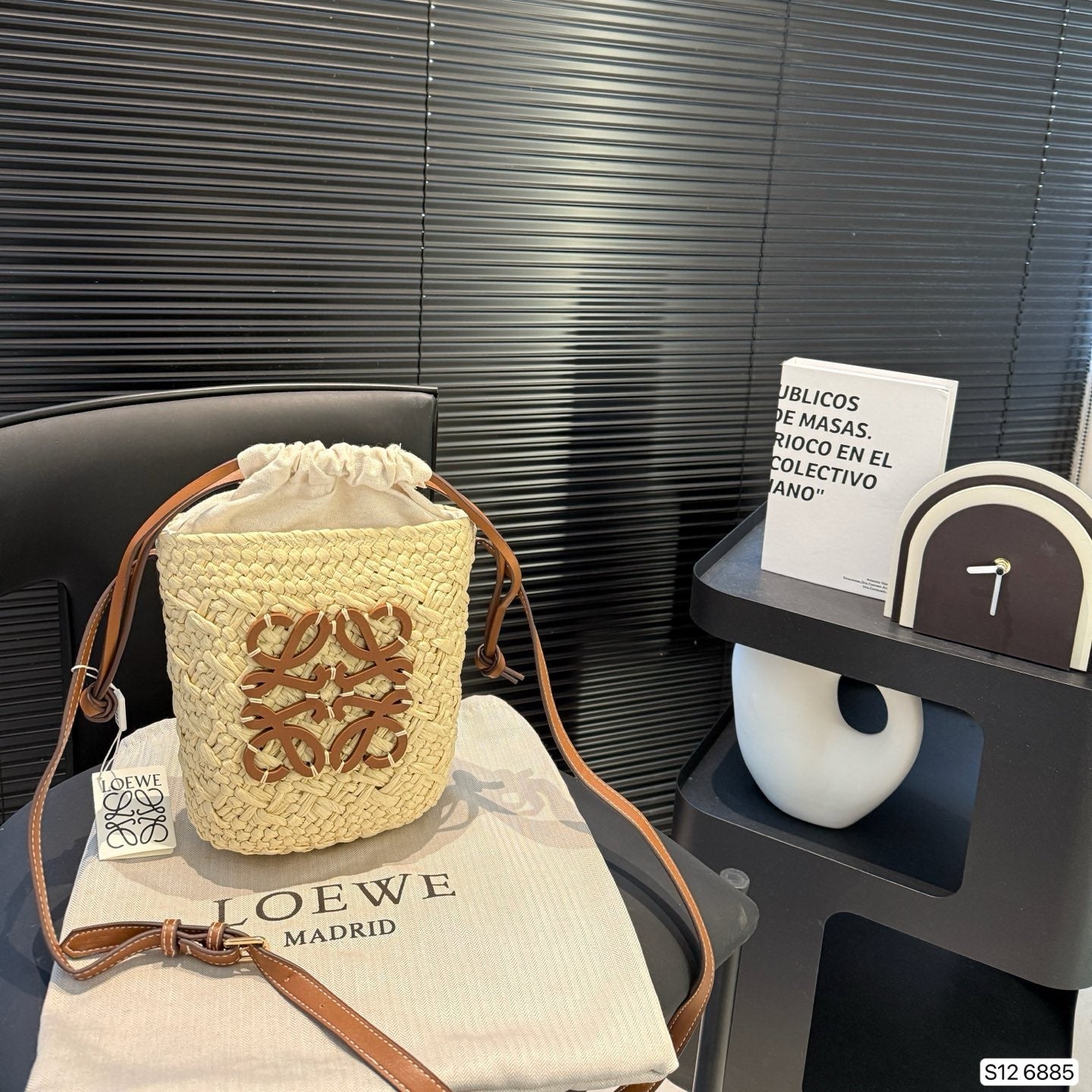 L°EWE - Square pocket in iraca palm and calfskin Beige